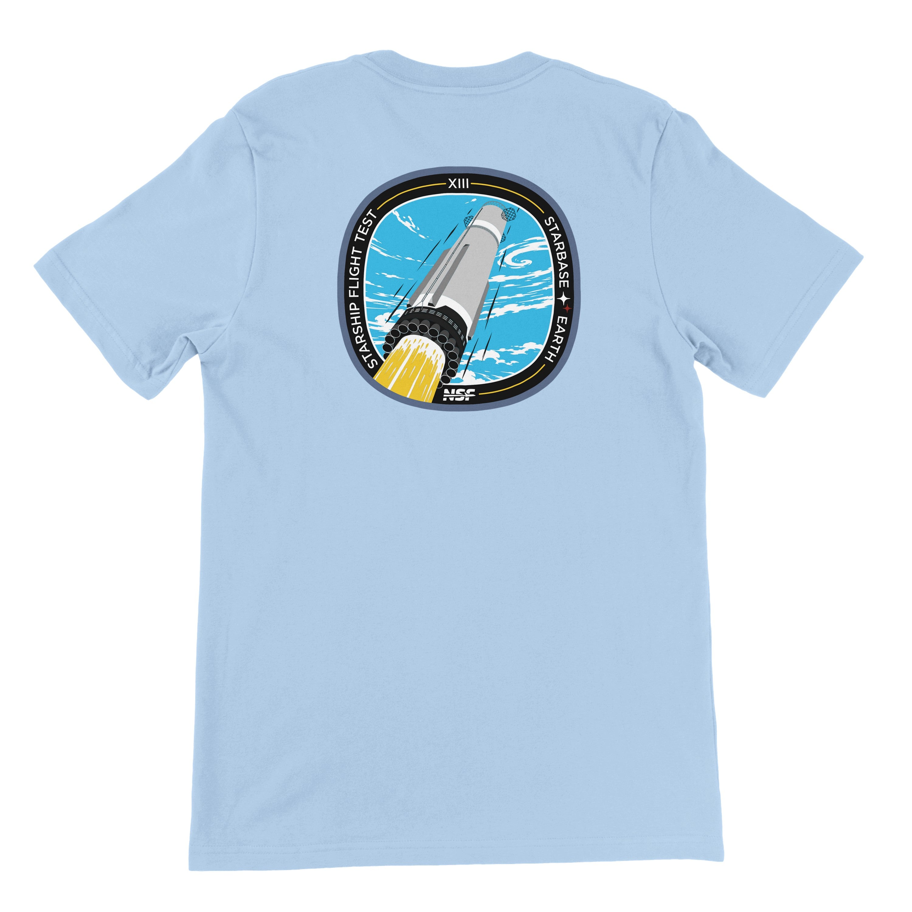 A light blue T-shirt featuring the NSF SpaceX Starship Flight 13 design on the back. 
