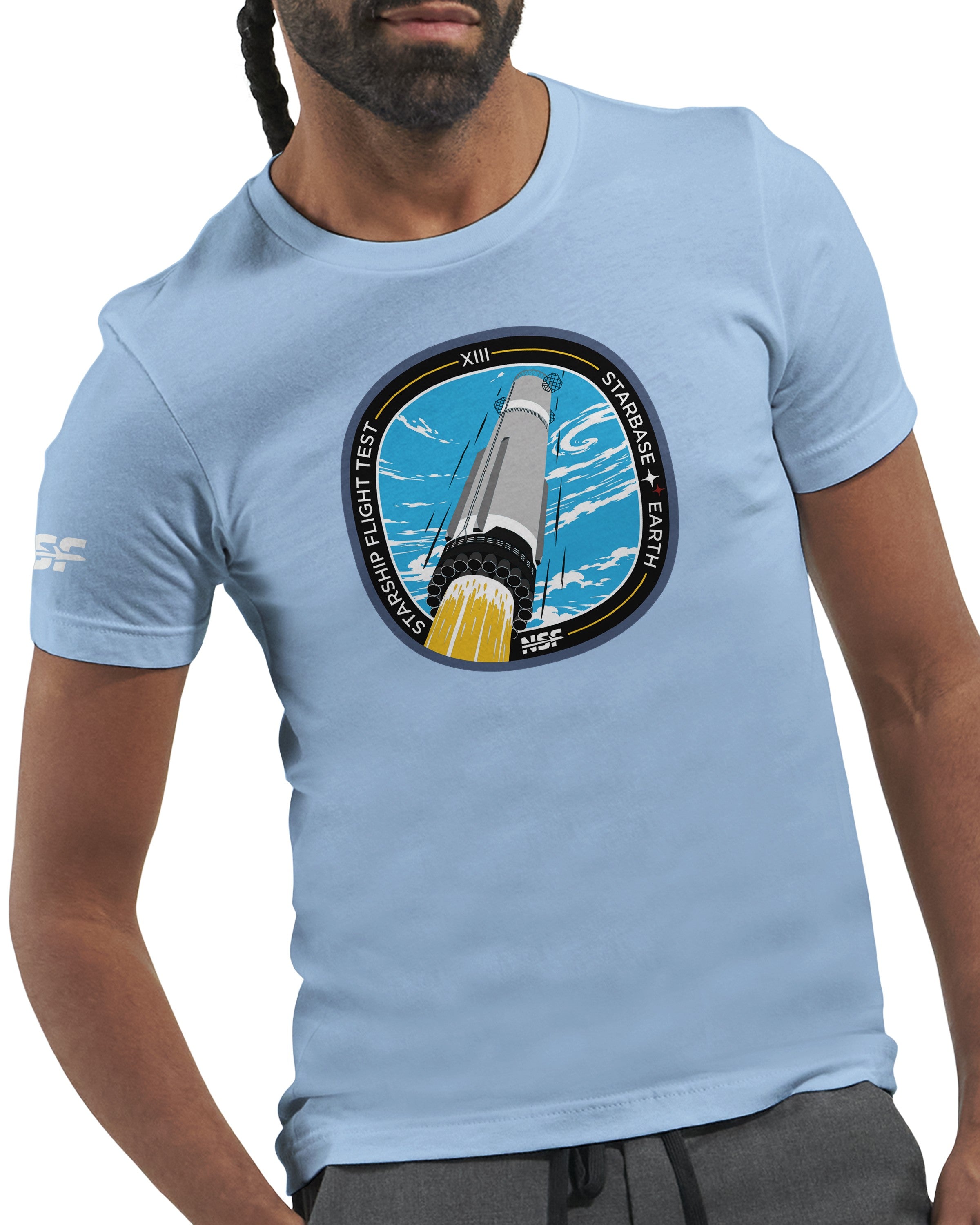 A Light Blue t-shirt featuring the NSF SpaceX Starship Flight 13 design on the front. 