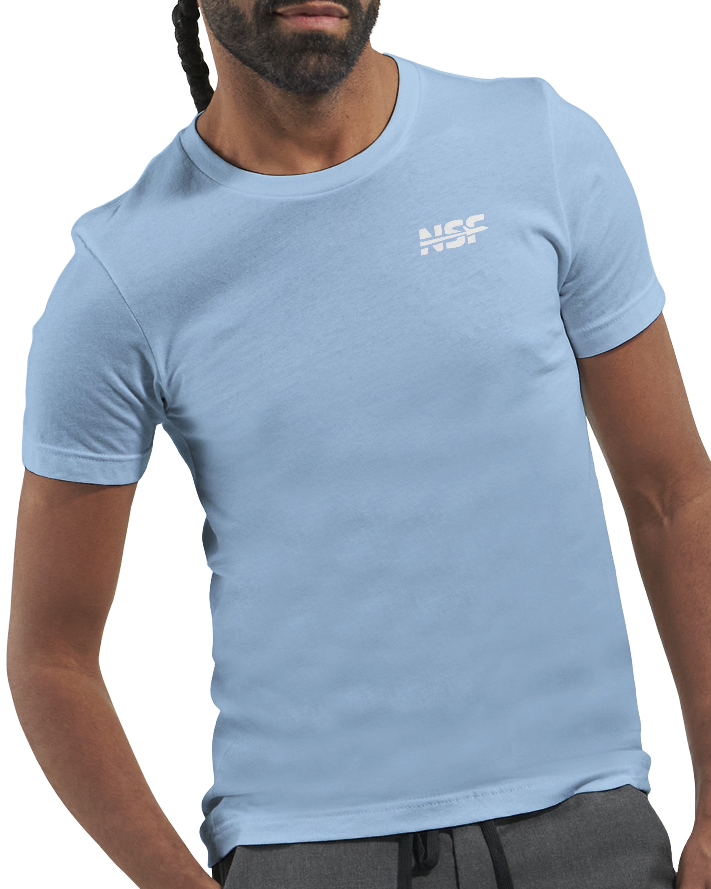 A light blue t-shirt on a male model with a white nsf logo on the front. 